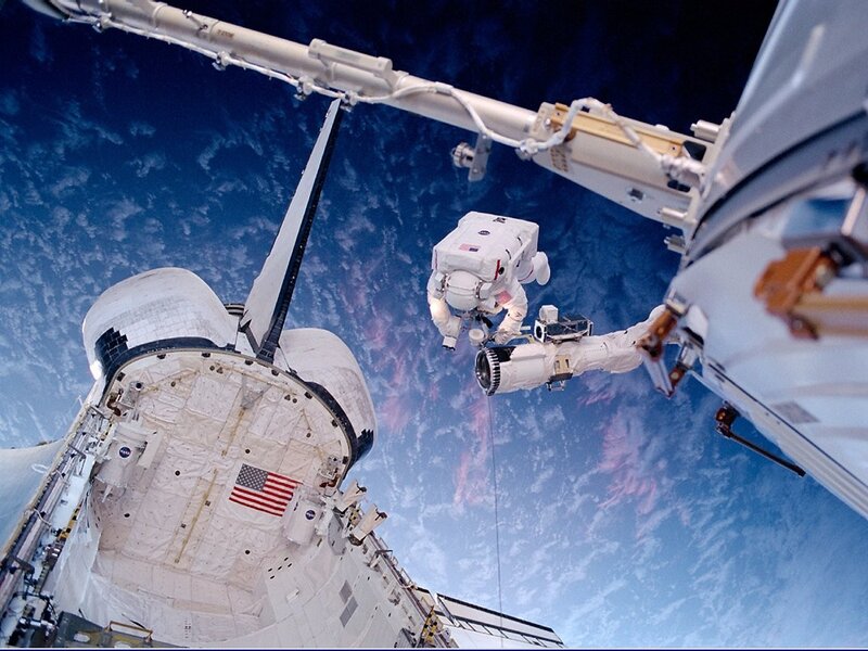 Astronaut Performing Spacewalk — Blue, Dramatic, Photograph, Space Shuttle