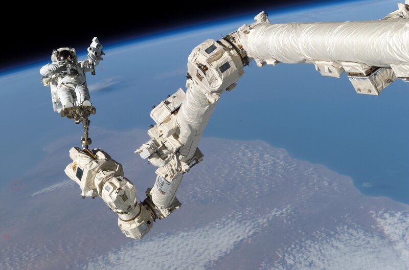 Astronaut Performing Spacewalk — Blue, Dramatic, Photograph, Space Station