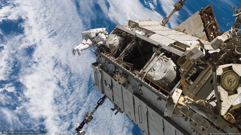 Astronaut Performing Spacewalk — Blue, Dramatic, Photograph