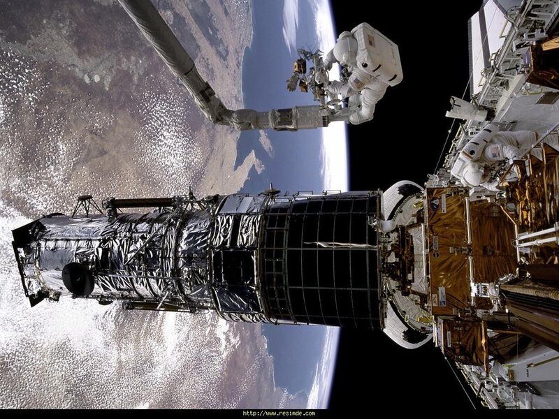 Astronaut Repairing Telescope
