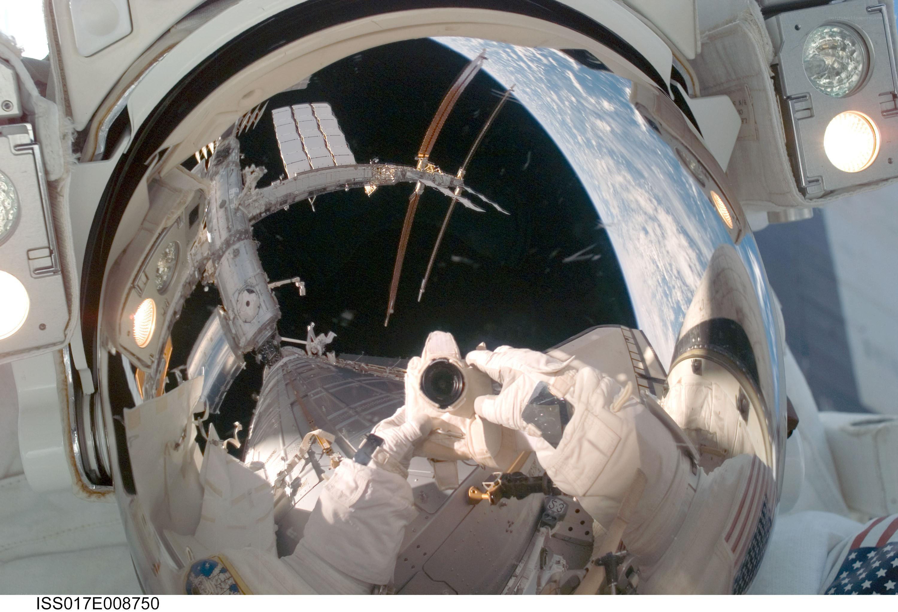 Astronaut taking photo in space