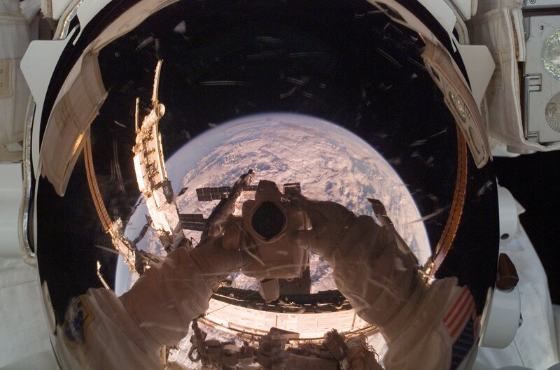 Astronaut taking photo of Earth