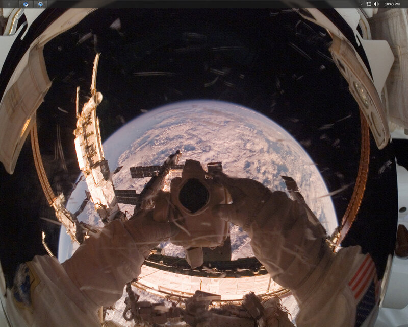 astronaut taking photo of earth