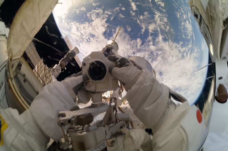 Astronaut taking photo of Earth