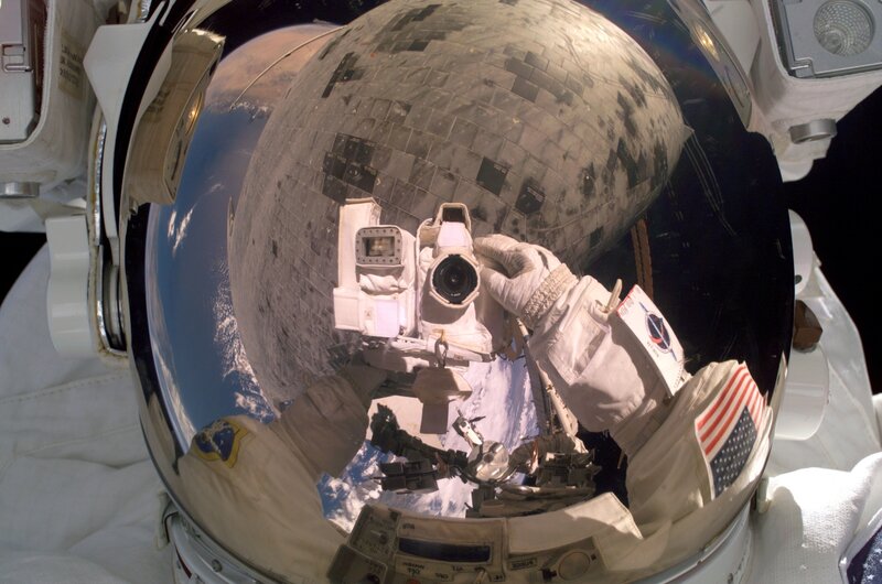 Astronaut Taking Photo — White