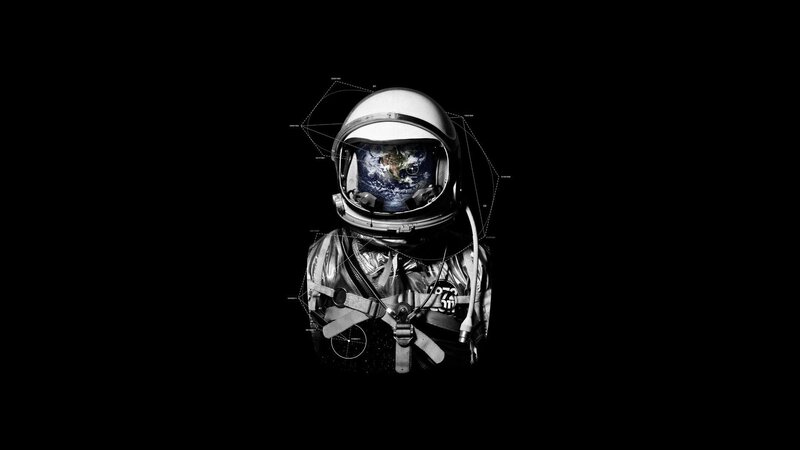 astronaut with earth reflection
