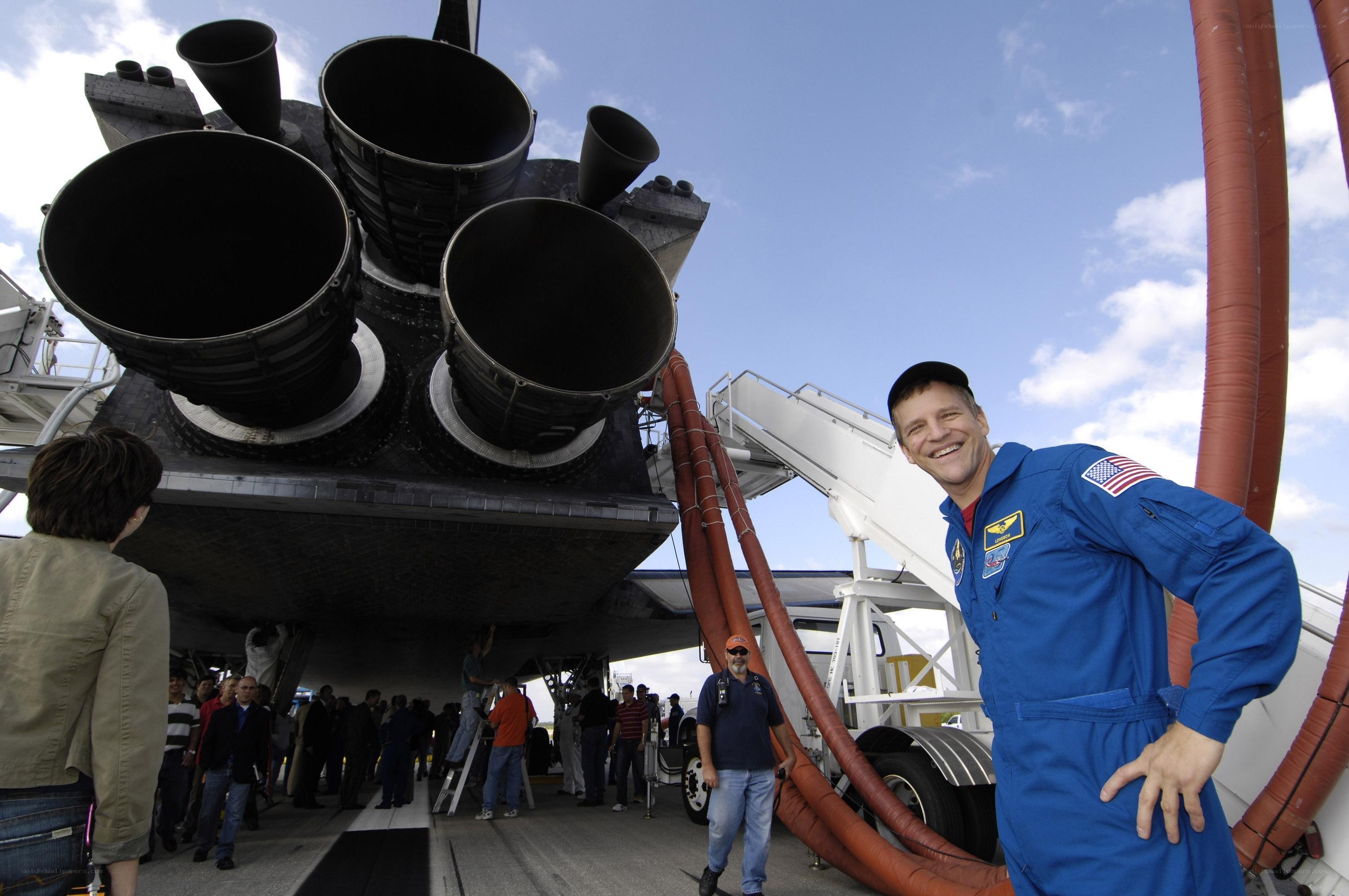 Astronaut with shuttle engine