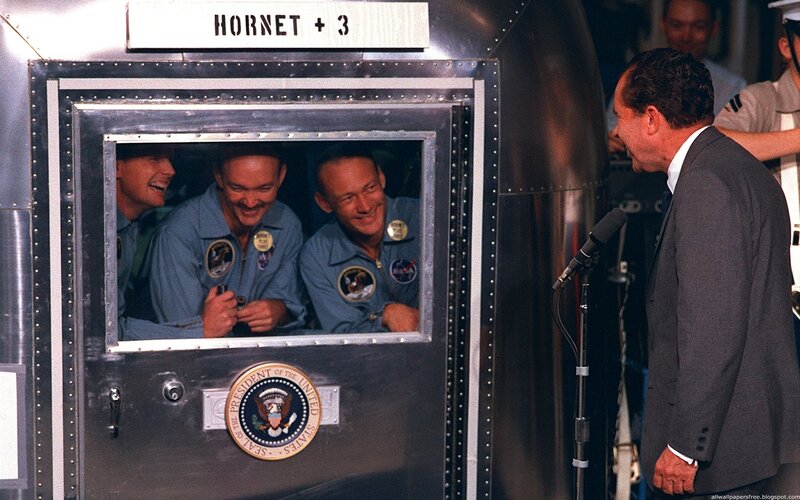 Astronauts in a capsule