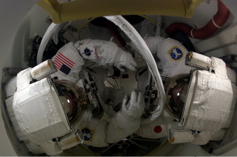 Astronauts in space shuttle