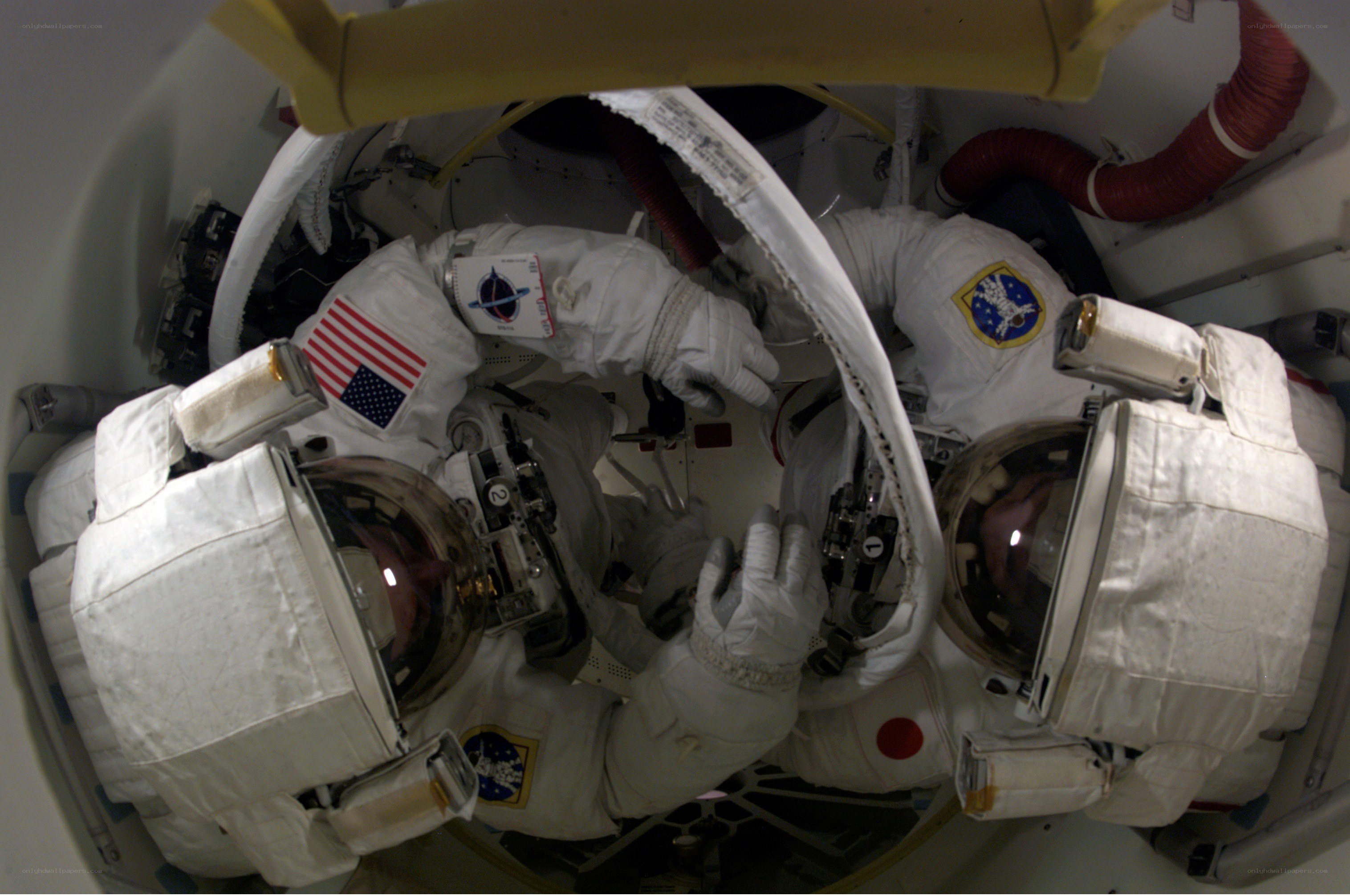 Astronauts in space shuttle