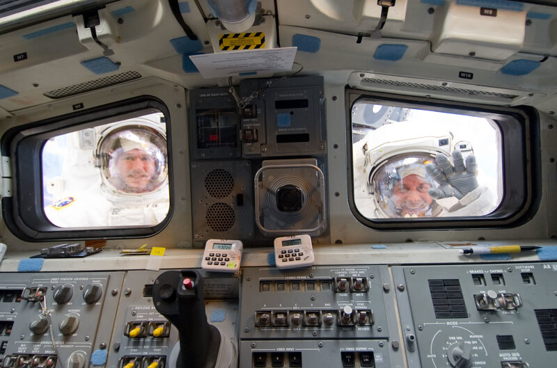 Astronauts in space shuttle