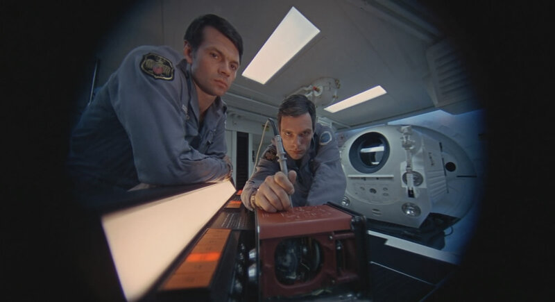 astronauts in spacecraft