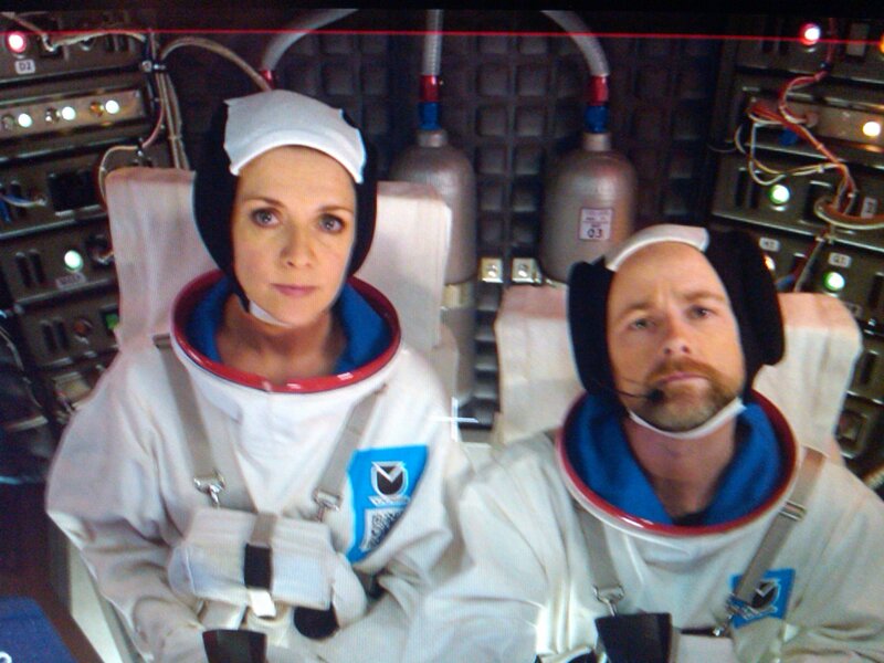 astronauts in spacecraft