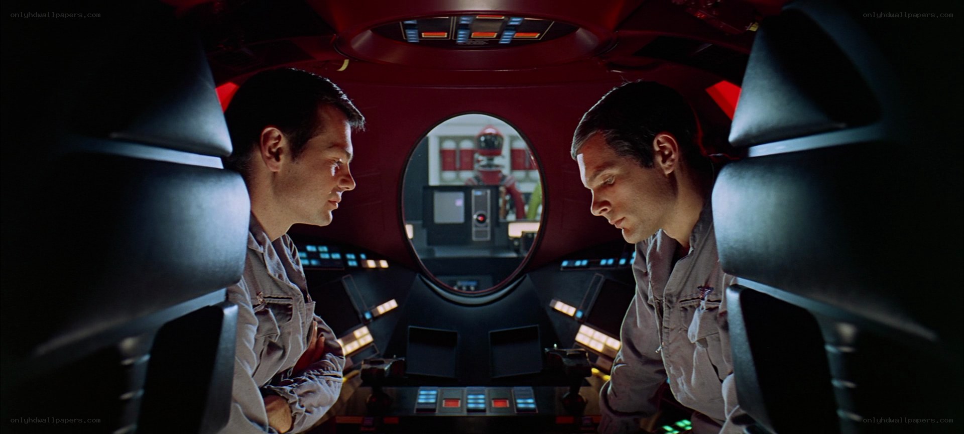astronauts in spacecraft cockpit