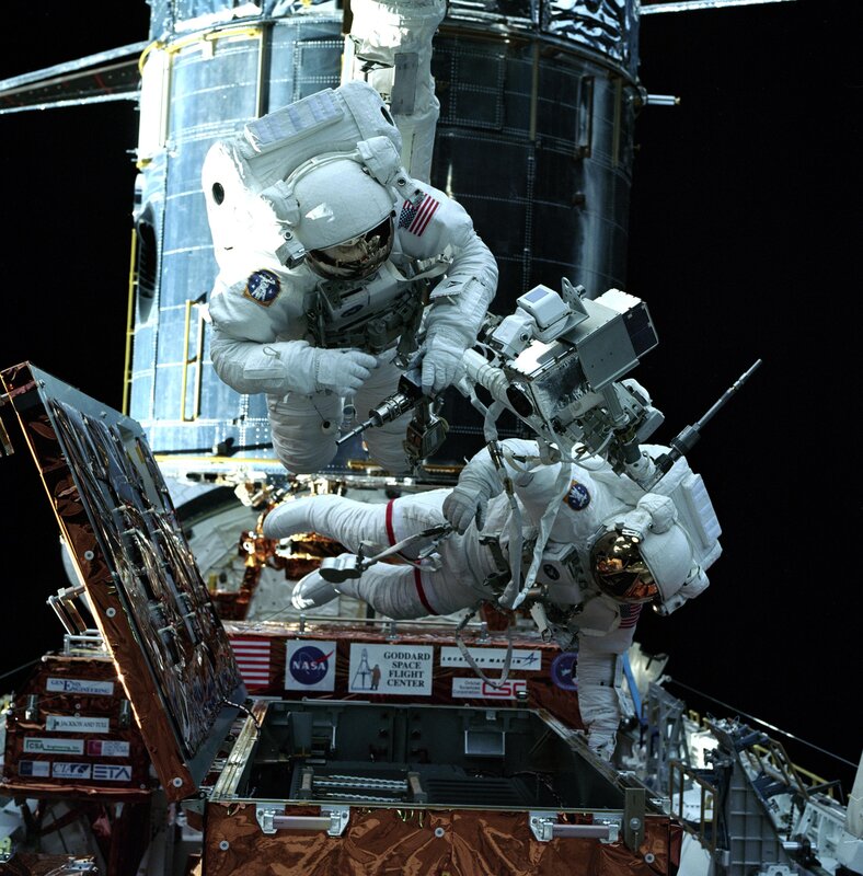 Astronauts in spacewalk