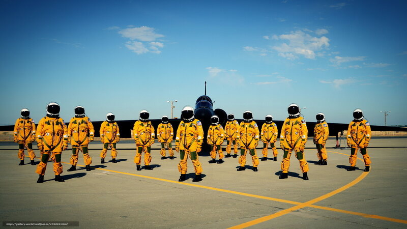 Astronauts in yellow suits