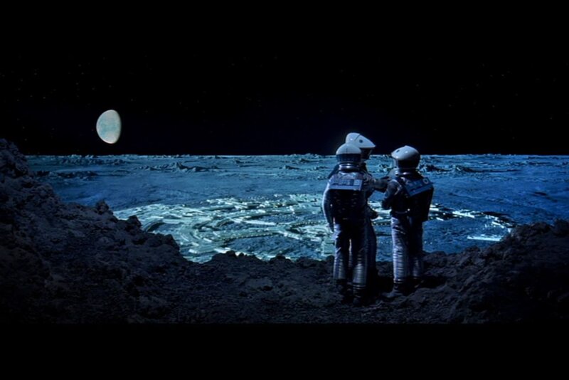 Astronauts on a moonlit planet