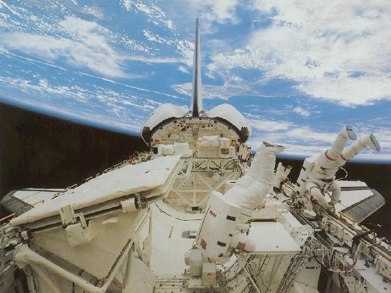 Astronauts on a spacewalk