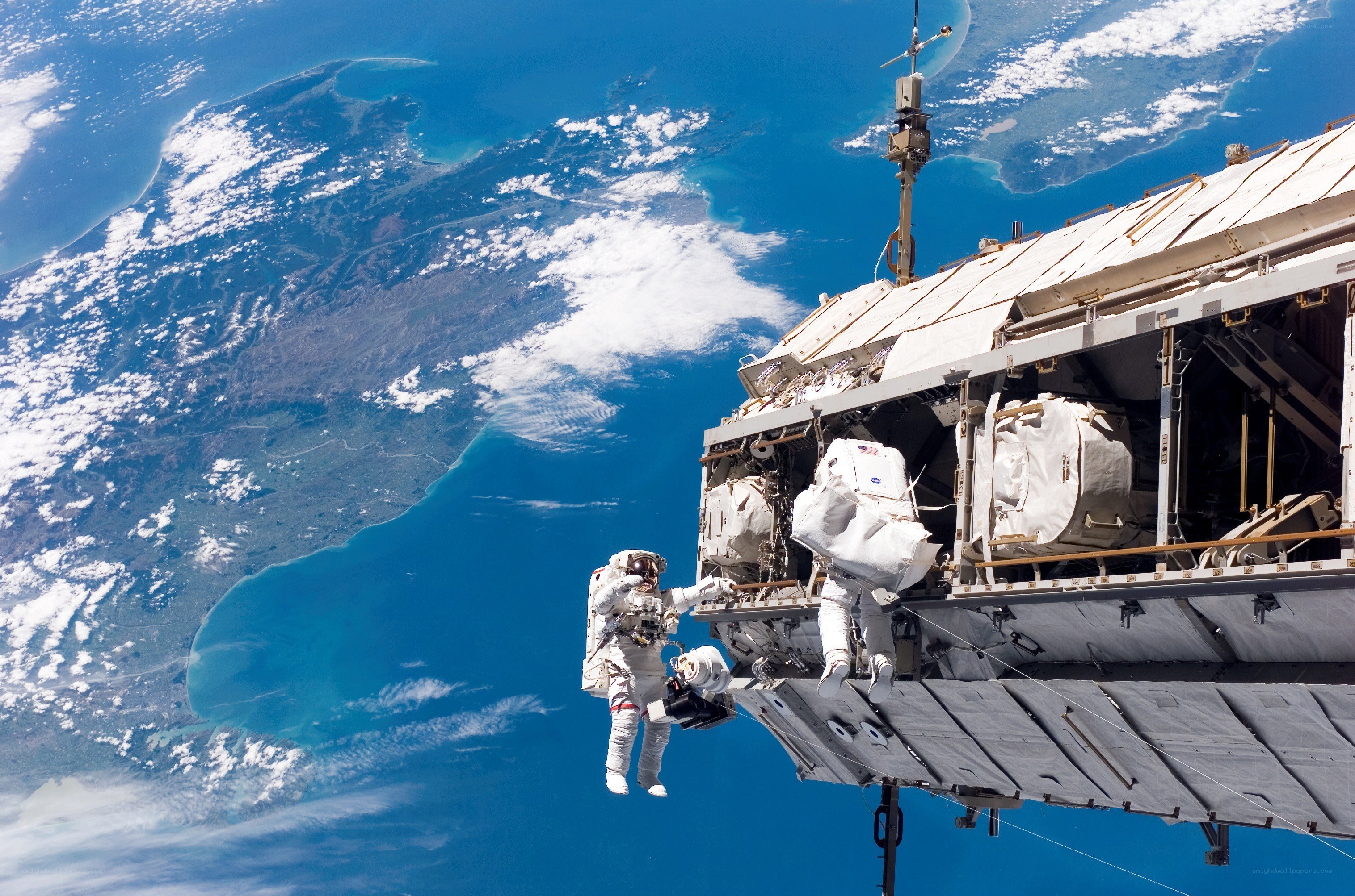 Astronauts on spacewalk