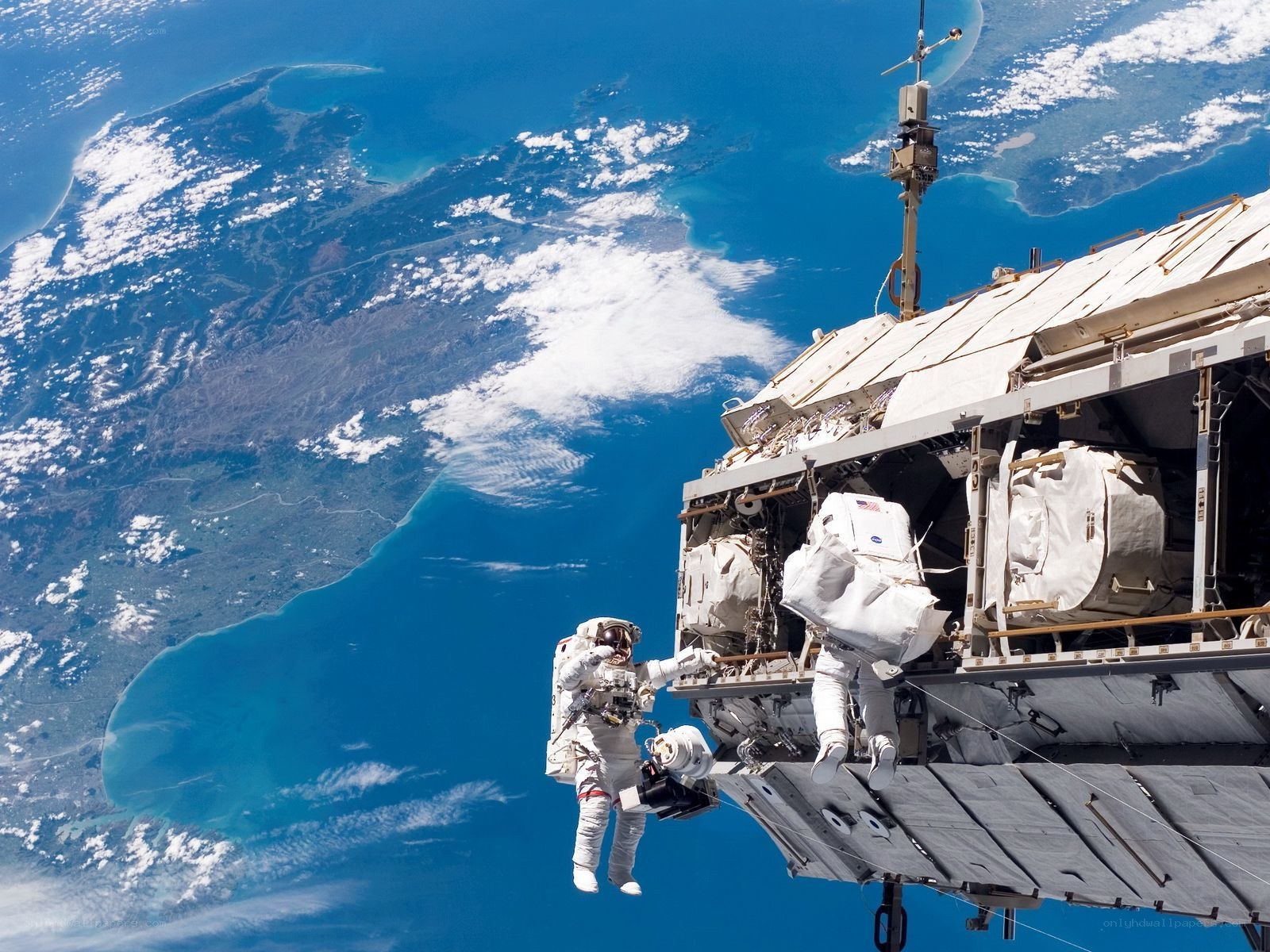 Astronauts on spacewalk