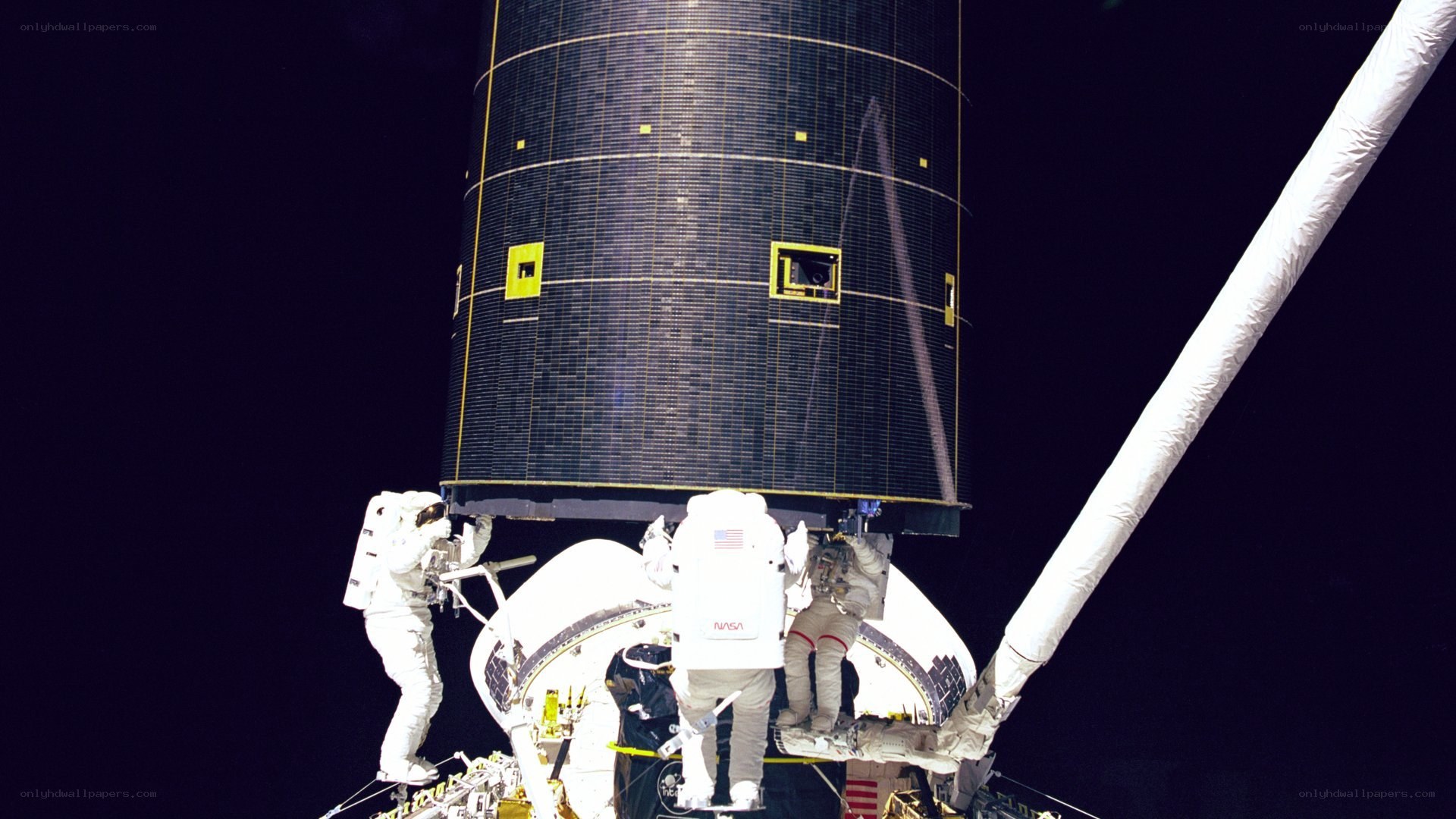Astronauts on spacewalk