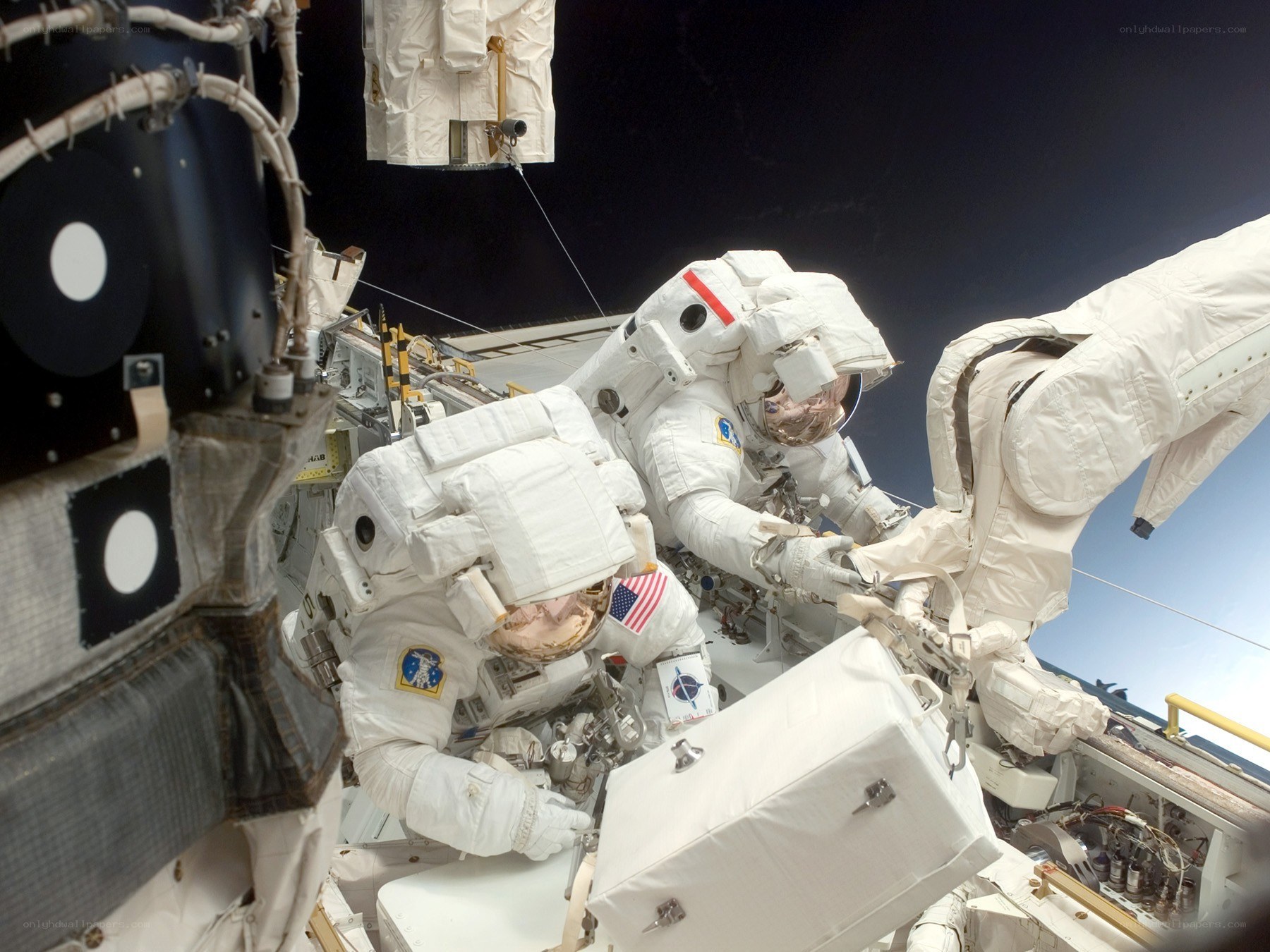 Astronauts on spacewalk