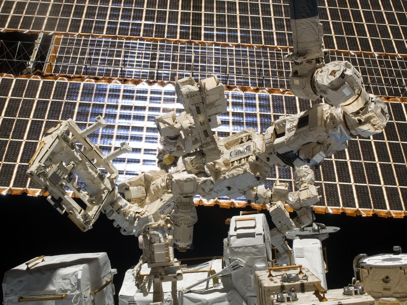 Astronauts on spacewalk