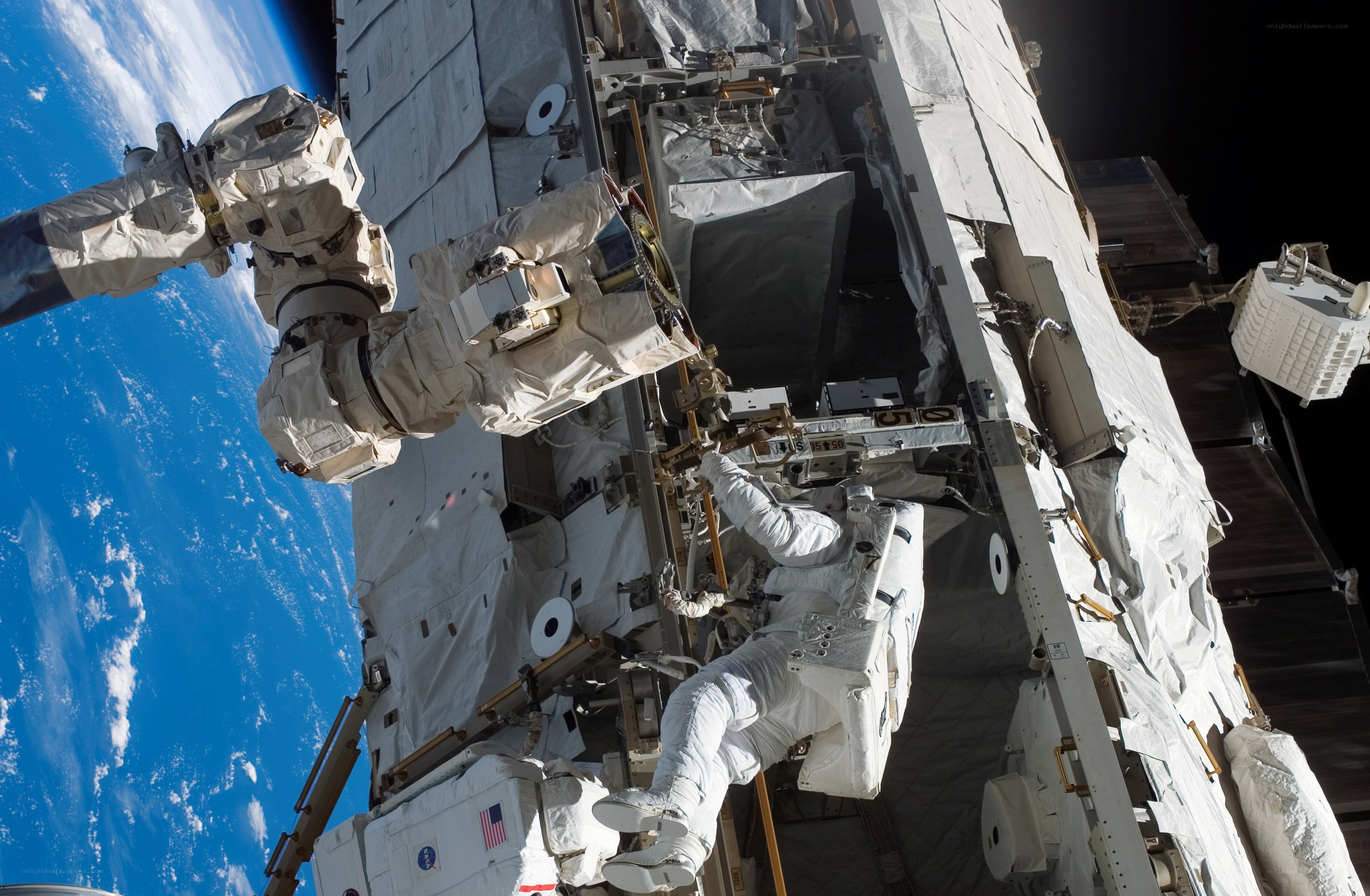 Astronauts on spacewalk