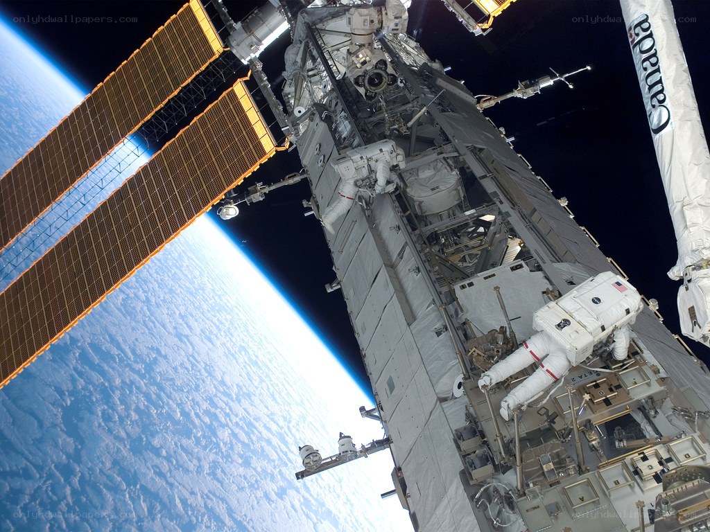 Astronauts on spacewalk