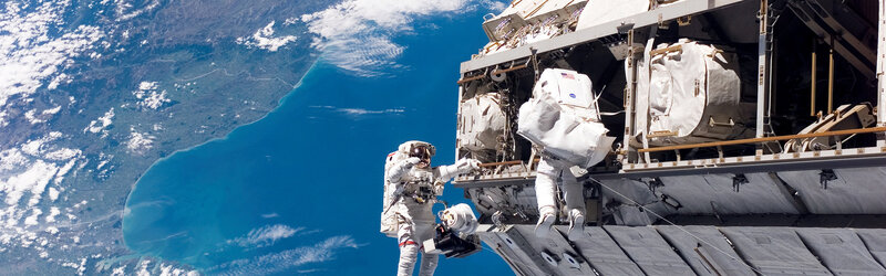 Astronauts on spacewalk