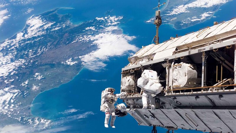 Astronauts on spacewalk