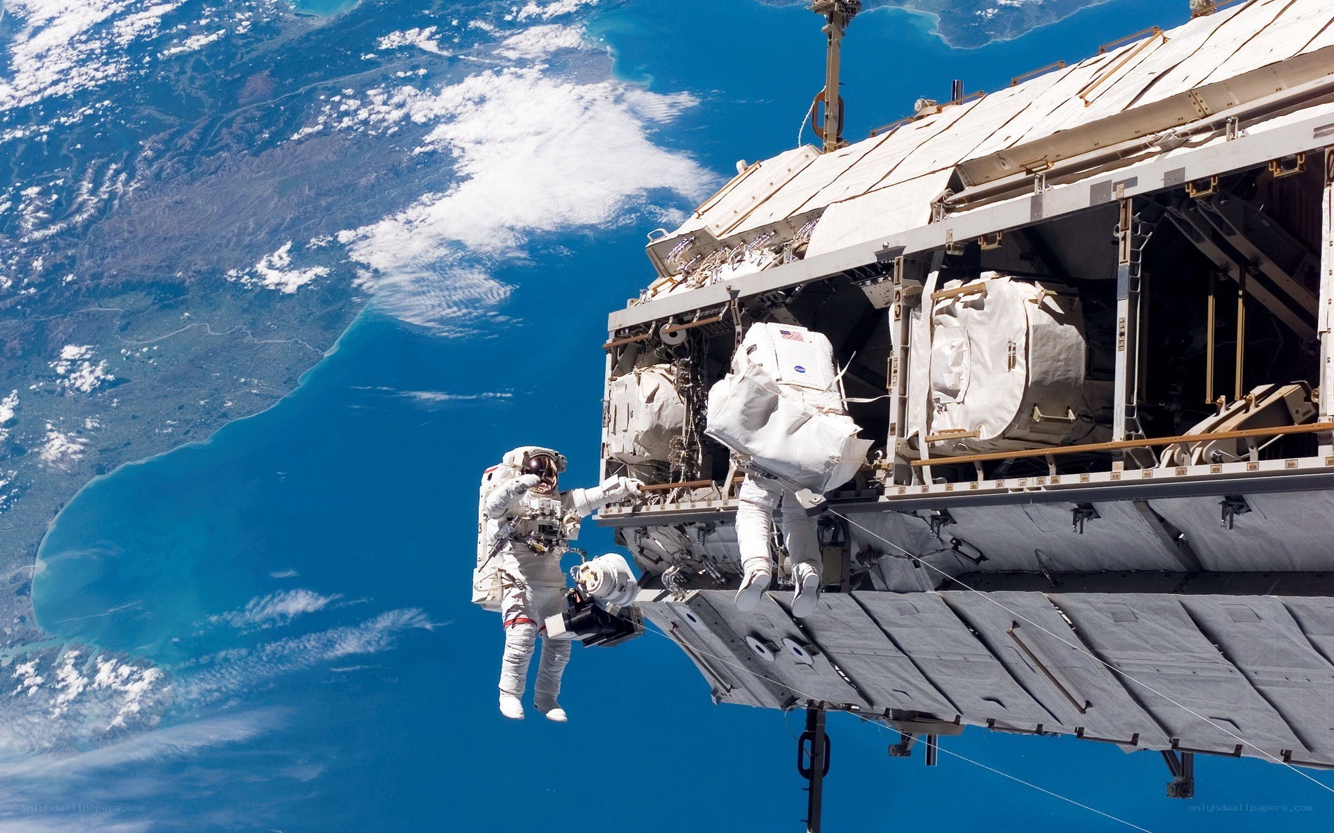 Astronauts on spacewalk