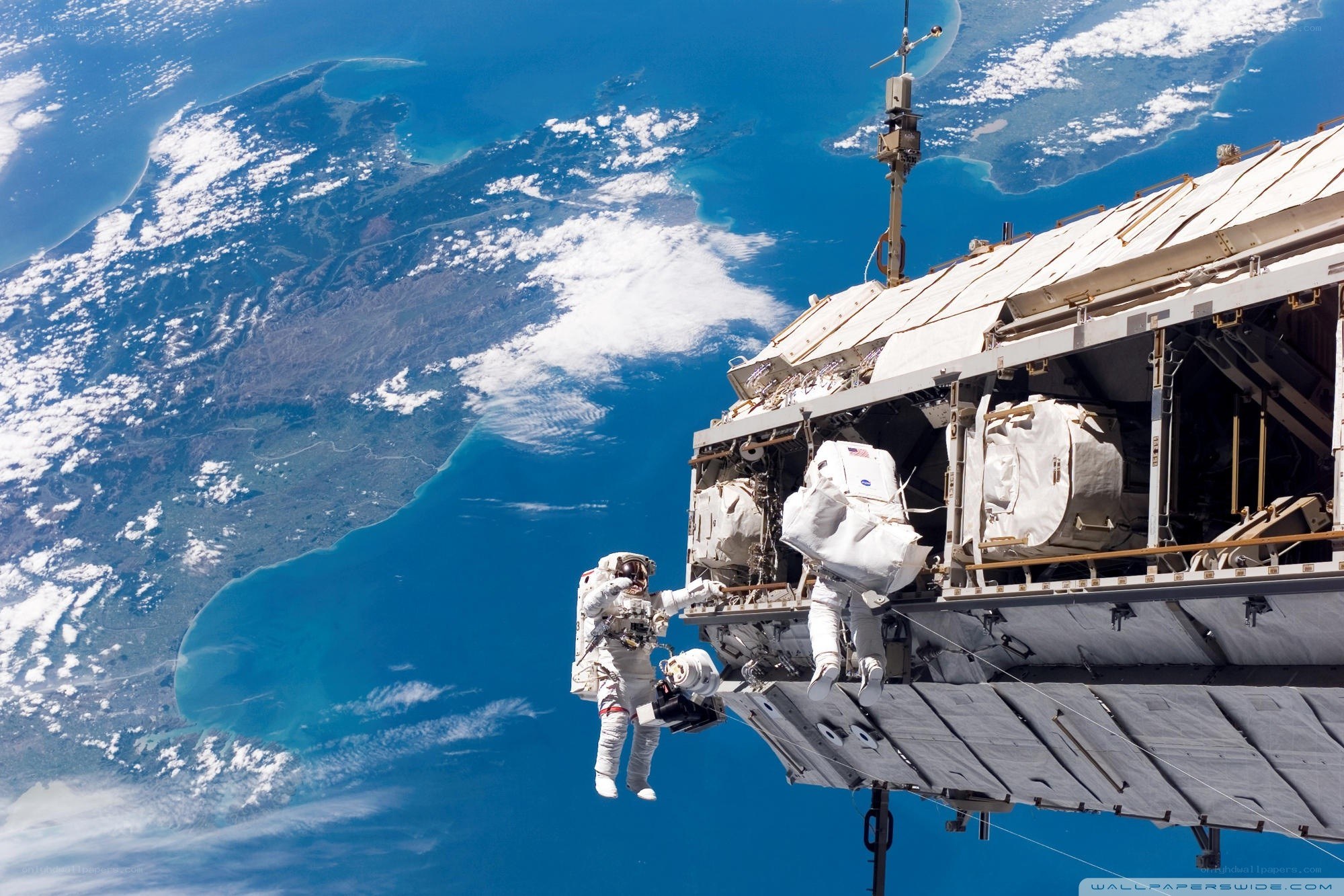 Astronauts on spacewalk
