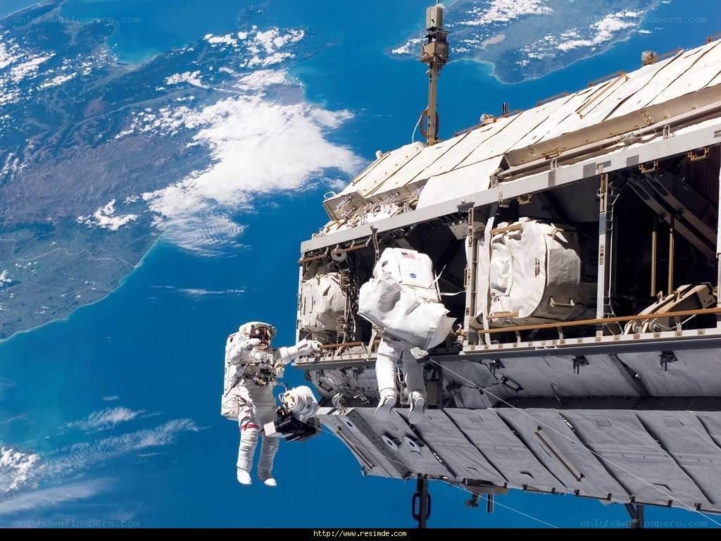 Astronauts on spacewalk