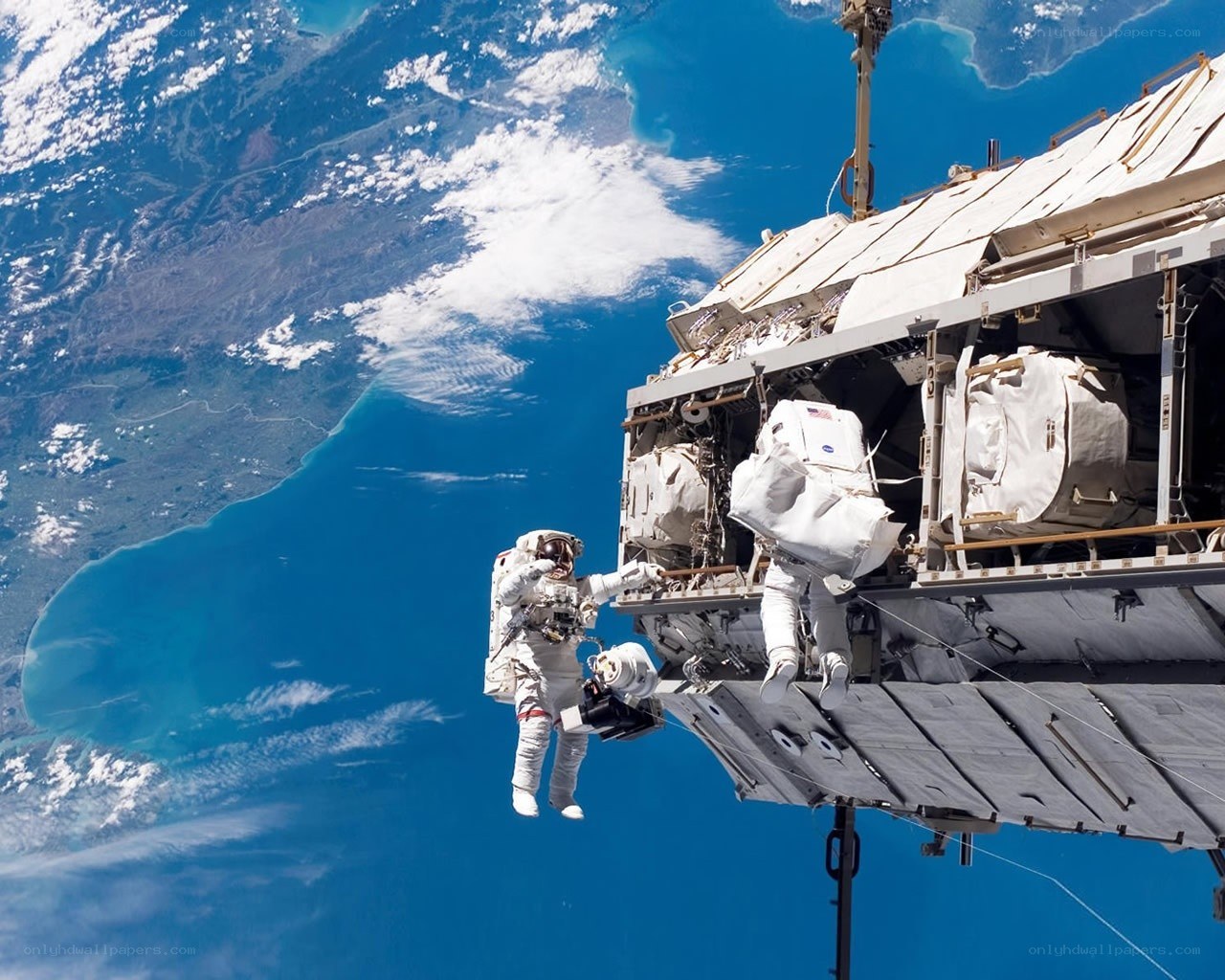 Astronauts on spacewalk