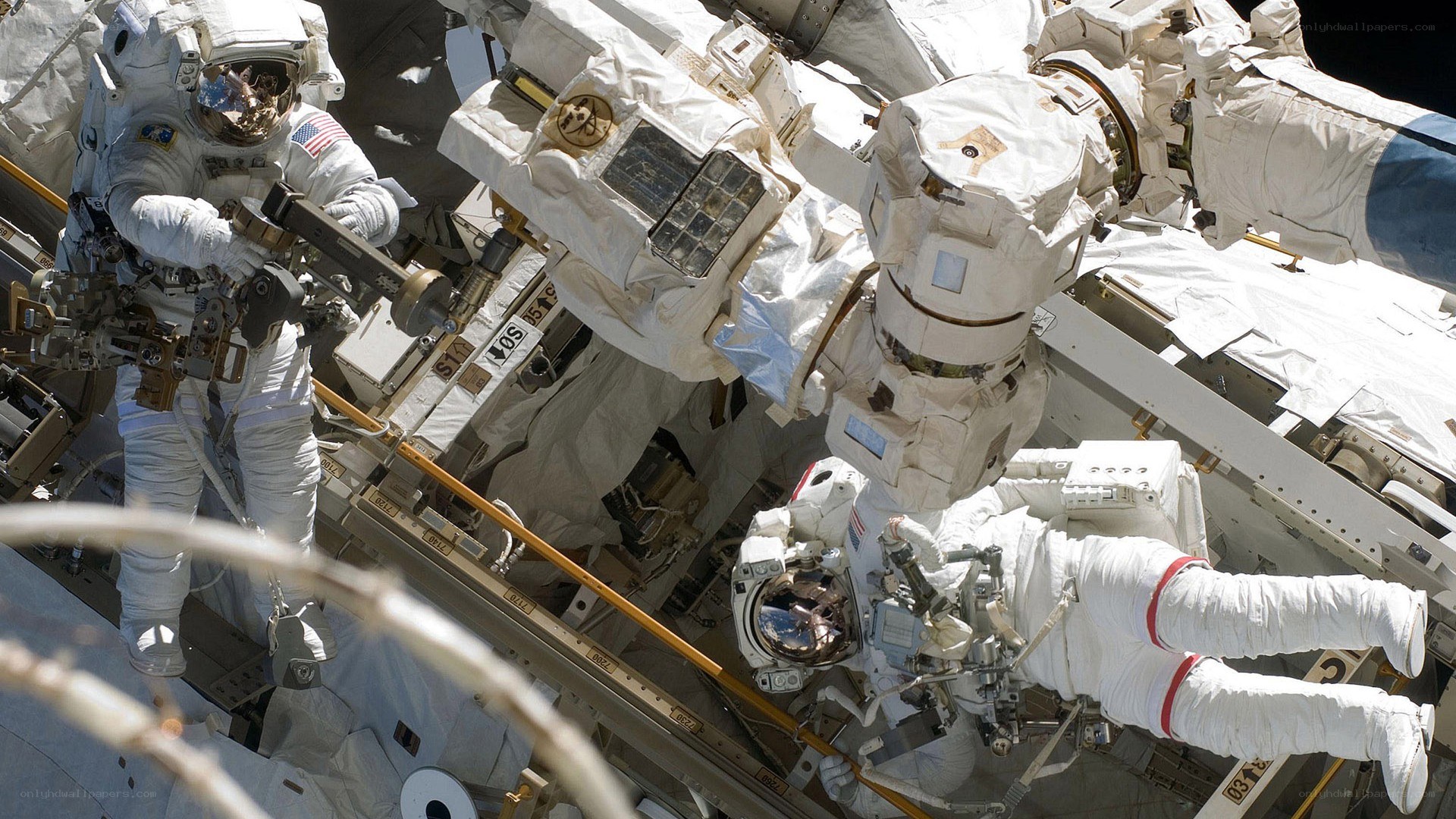 Astronauts on spacewalk