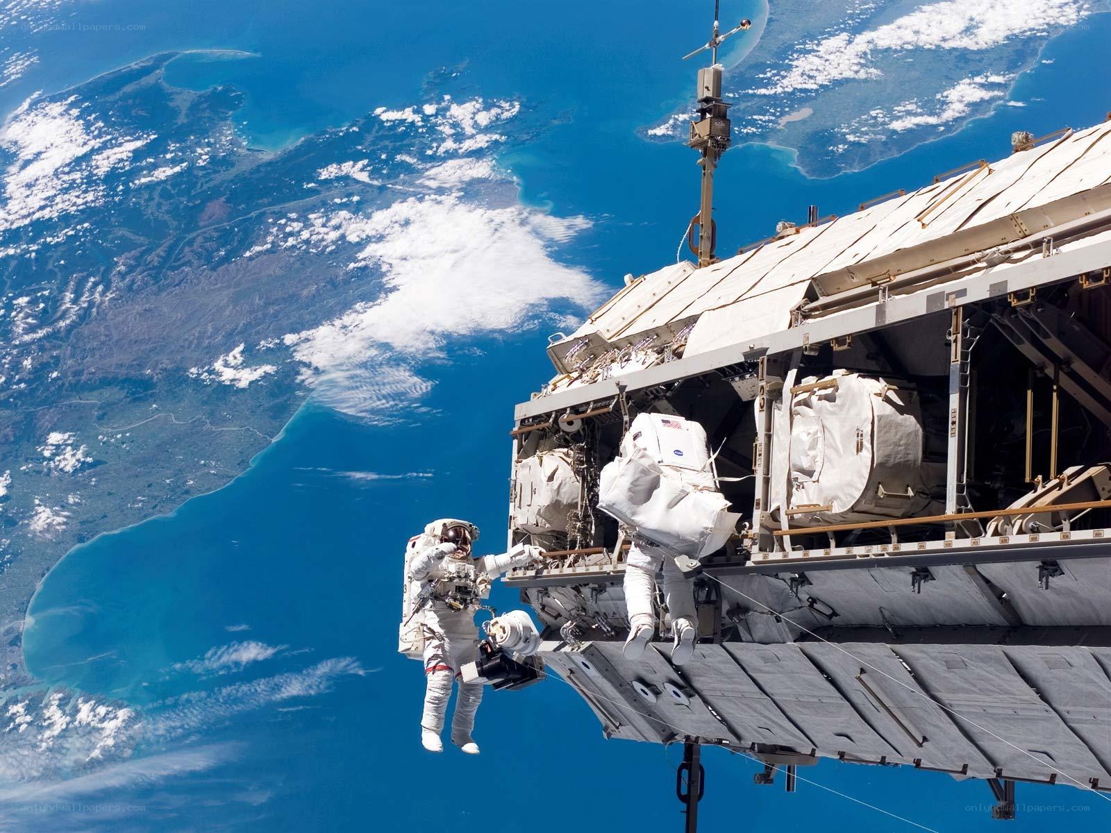Astronauts on spacewalk