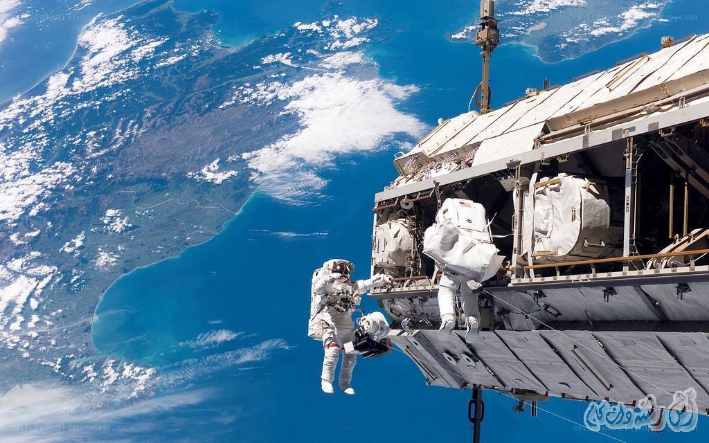 Astronauts on spacewalk