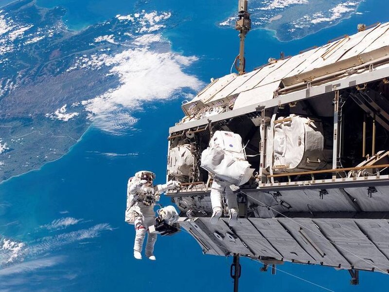 Astronauts on spacewalk