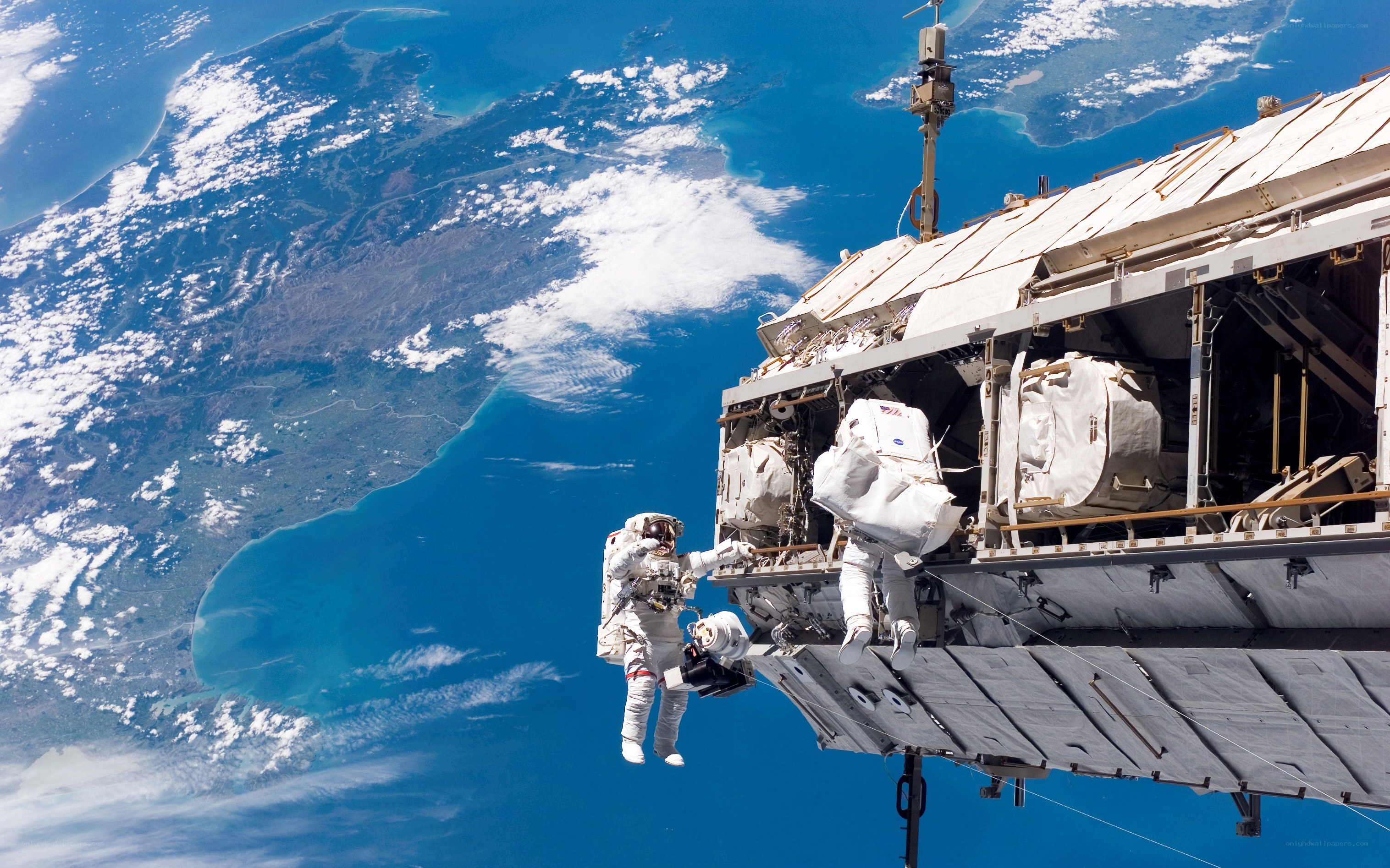 Astronauts on spacewalk