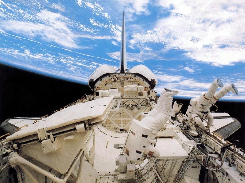 Astronauts on Spacewalk — Blue