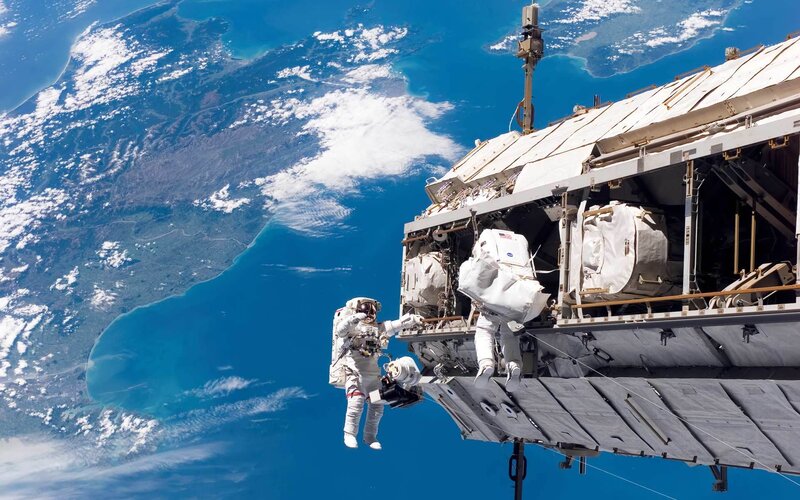 Astronauts on Spacewalk — Gray