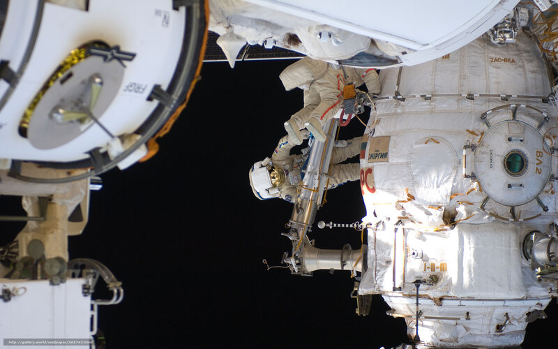 Astronauts on Spacewalk — White, Dramatic