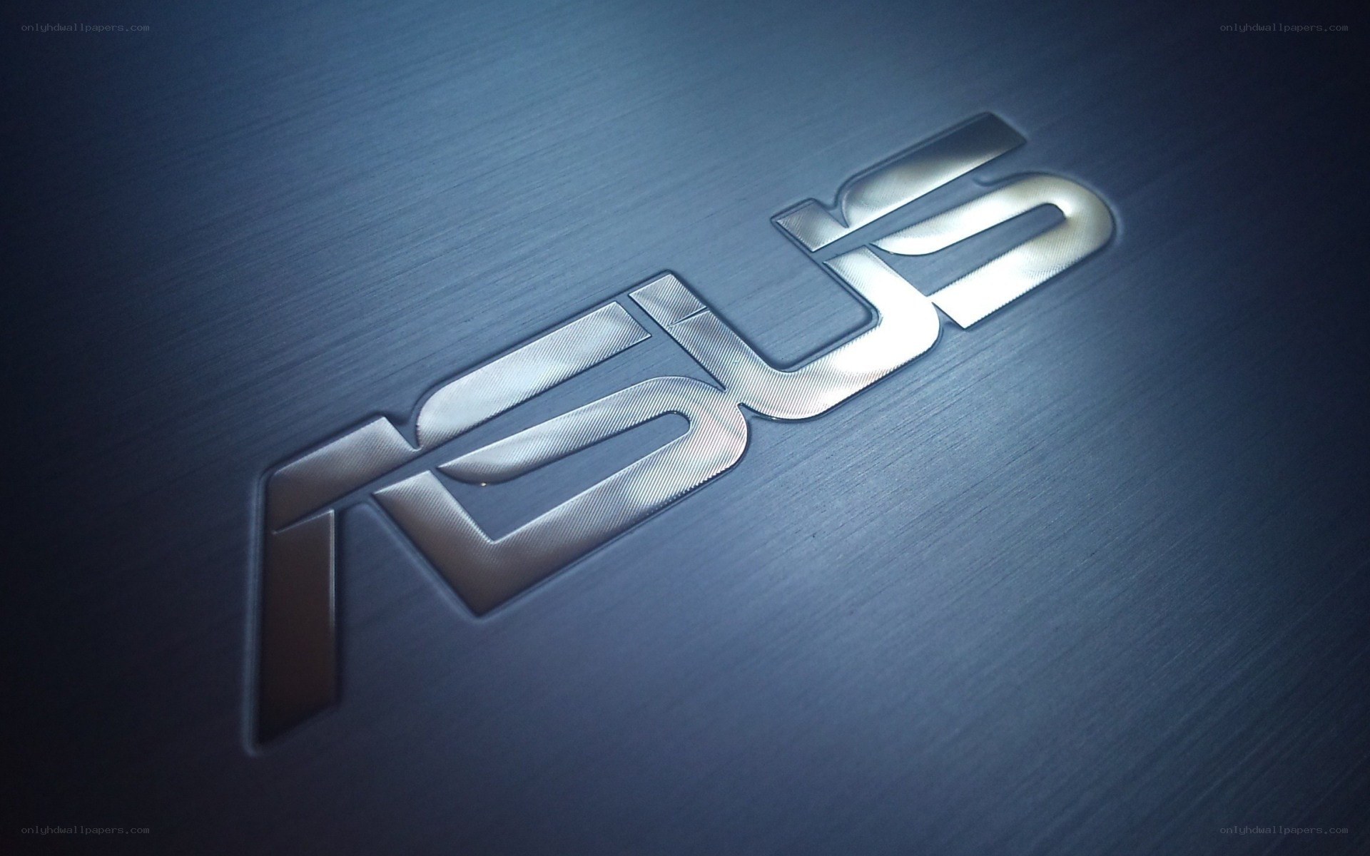 ASUS logo on metal surface