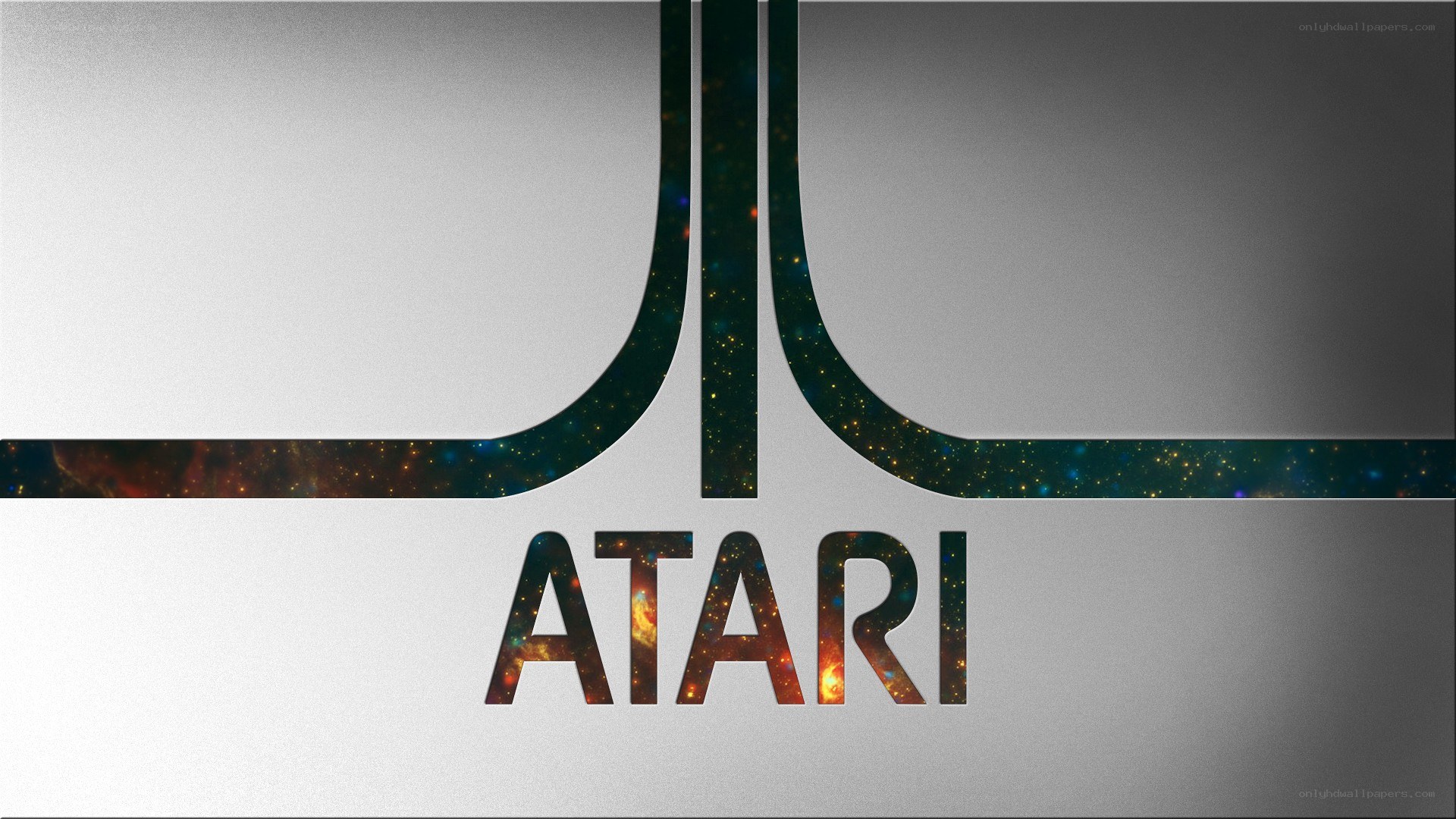 Atari logo with galaxy background