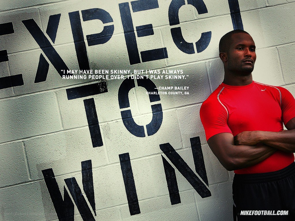 athlete against wall with quote