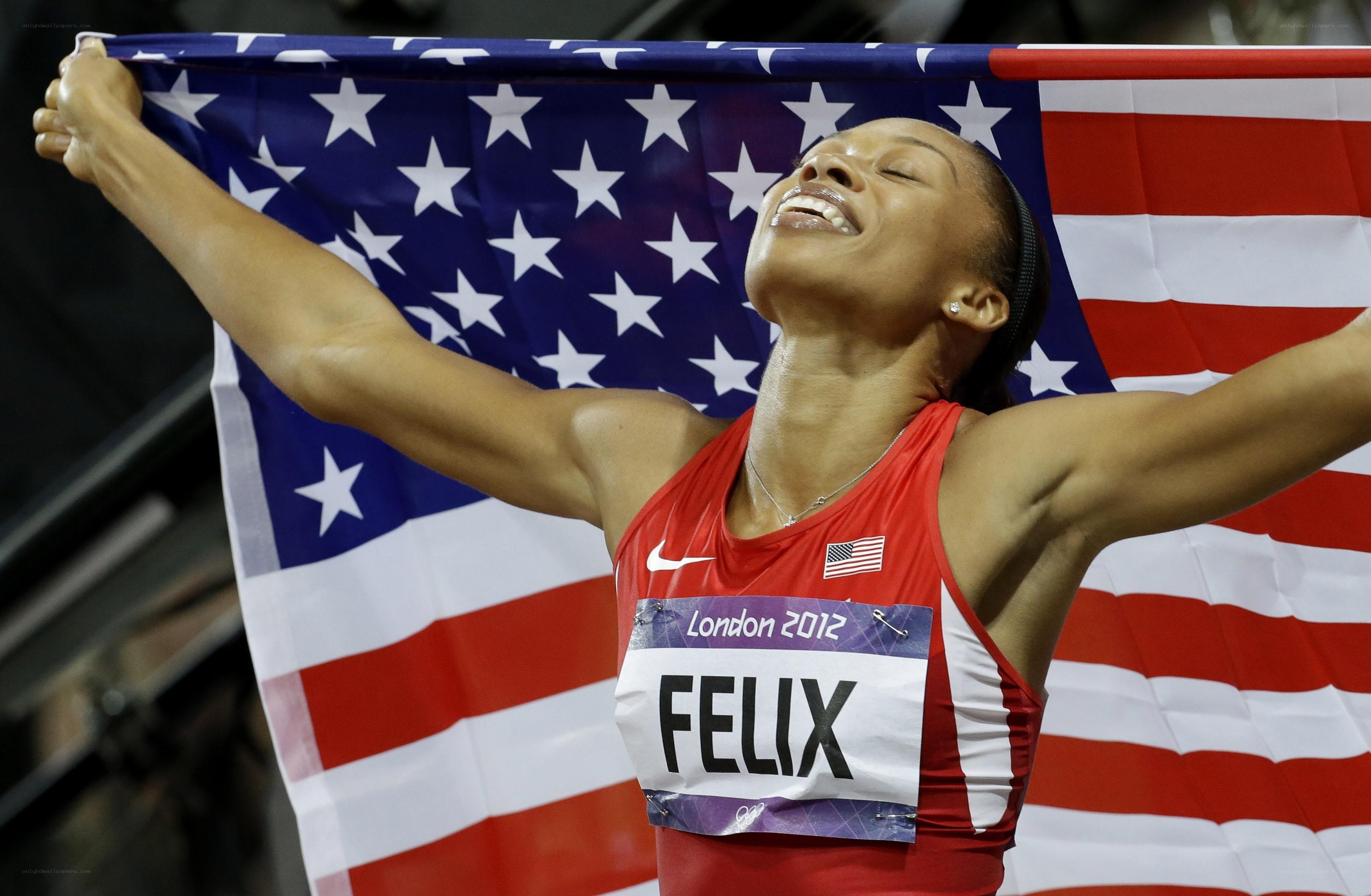 Athlete celebrating with flag