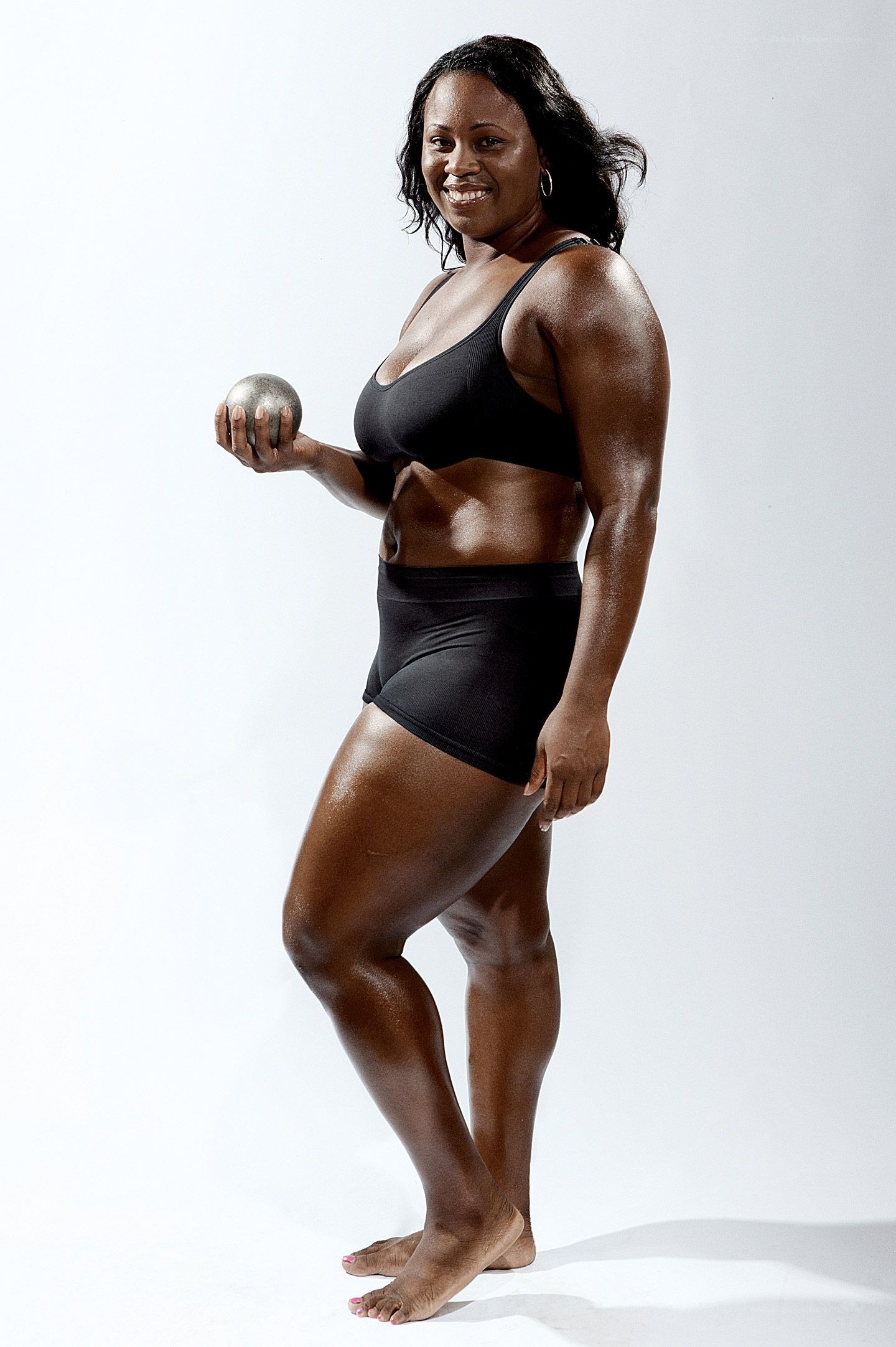 Athlete holding shot put