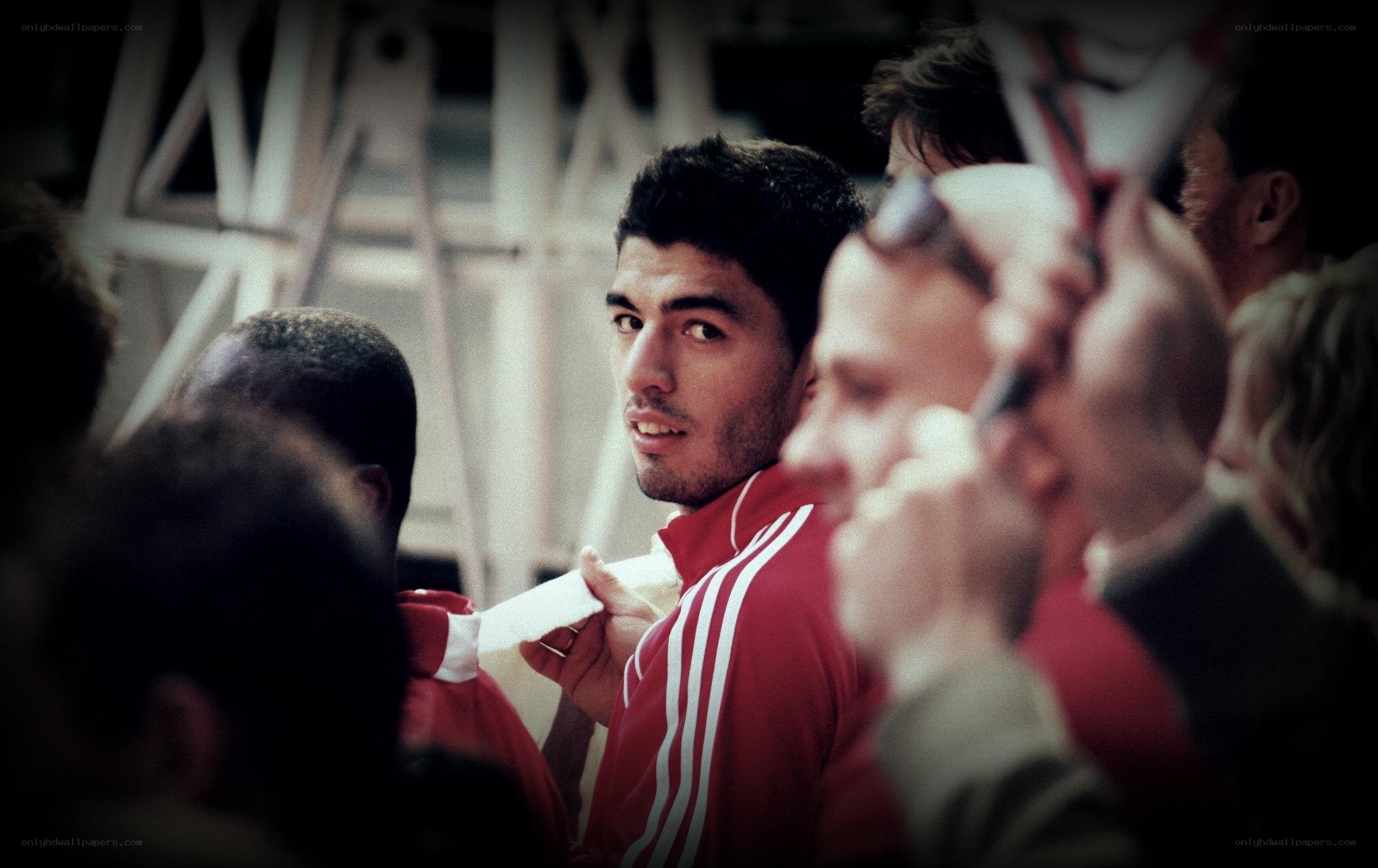 athlete in red tracksuit