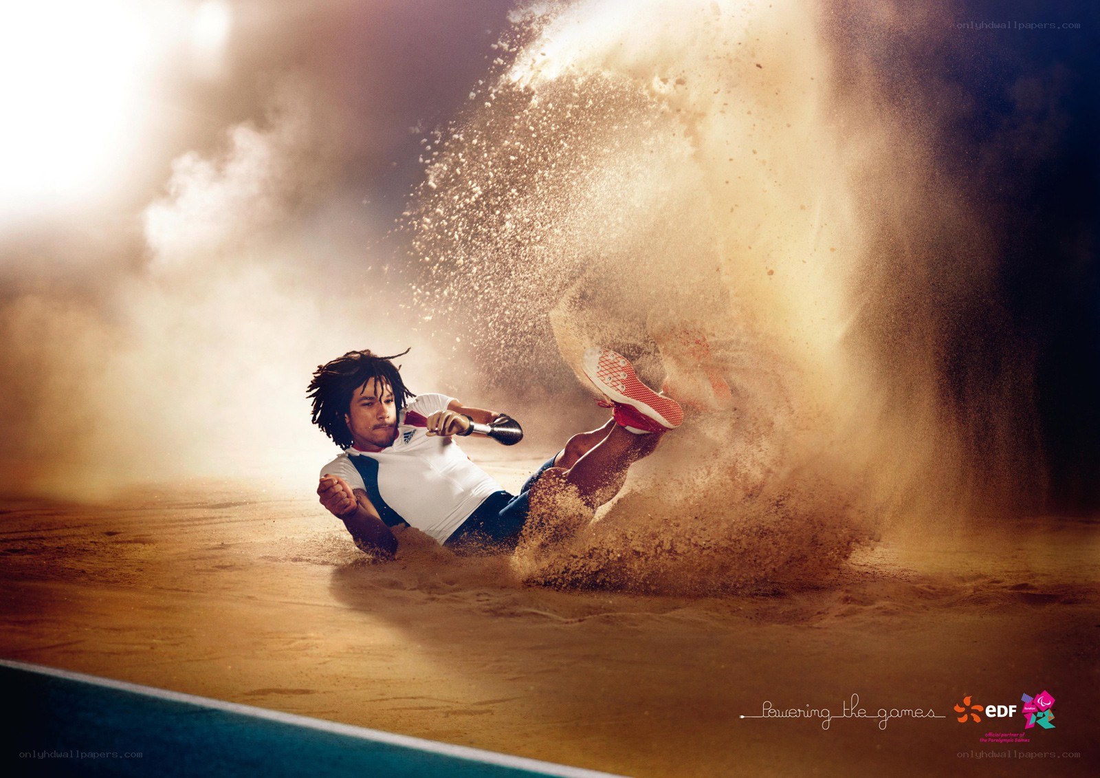 athlete in sand dune action